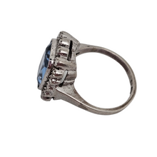 Load image into Gallery viewer, Old Art Deco ring in 835 silver set with an emerald-cut light blue spinel surrounded by 18 marcasites