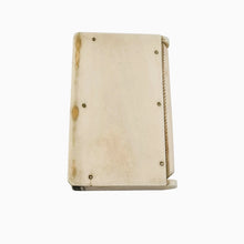 Load image into Gallery viewer, Boîte à allumettes en os sculpté en forme de livre, fin XIXᵉ / début XXᵉ siècle Le Charme des Violettes - Brocante en ligne