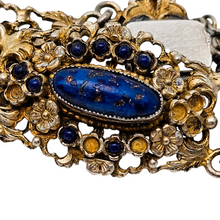 Load image into Gallery viewer, Bracelet en argent doré serti de cabochons en pâte de verre bleu, années 1880-1910