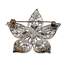 Load image into Gallery viewer, Broche fleur ajourée vintage aux strass couleur ambre, années 1970-80 Le Charme des Violettes - Brocante en ligne