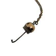 Load image into Gallery viewer, Edwardian perfume bottle in buffalo horn and chiseled brass, late 19th century.