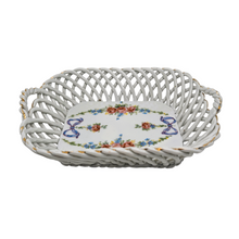 Load image into Gallery viewer, Petit panier ajouré en porcelaine au décor floral et rubans, fin XIXᵉ – début XXᵉ siècle Le Charme des Violettes - Brocante en ligne