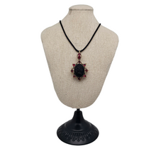 Load image into Gallery viewer, Victorian black glass cameo mourning pendant, 1890s-1900s