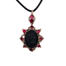 Load image into Gallery viewer, Victorian black glass cameo mourning pendant, 1890s-1900s