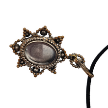 Load image into Gallery viewer, Victorian black glass cameo mourning pendant, 1890s-1900s