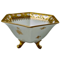 Load image into Gallery viewer, Sèvres (in the taste of). White porcelain tripod cup bordered with a gold frieze and small roses