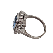 Load image into Gallery viewer, Old Art Deco ring in 835 silver set with an emerald-cut light blue spinel surrounded by 18 marcasites
