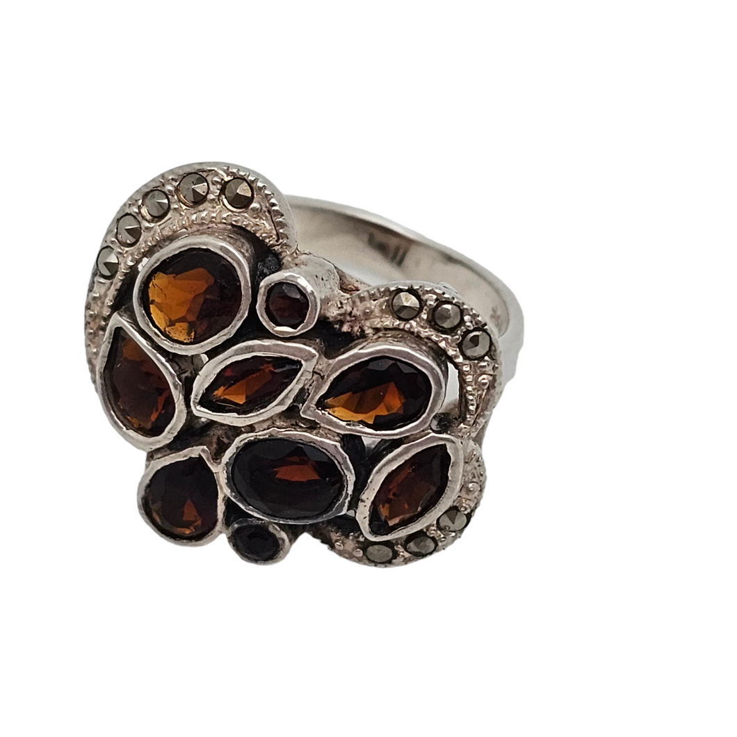 Old Art Deco ring in 925 silver set with 9 garnets and 11 marcasites, Polish hallmark