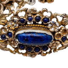 Load image into Gallery viewer, Bracelet en argent doré serti de cabochons en pâte de verre bleu, années 1880-1910
