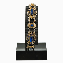 Load image into Gallery viewer, Bracelet en argent doré serti de cabochons en pâte de verre bleu, années 1880-1910 Le Charme des Violettes - Brocante en ligne
