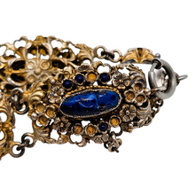 Load image into Gallery viewer, Bracelet en argent doré serti de cabochons en pâte de verre bleu, années 1880-1910

