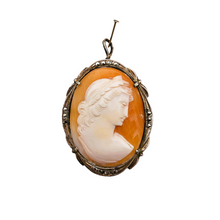 Load image into Gallery viewer, Shell cameo pendant brooch representing the God Apollo with laureate head, in an 800/1000 silver setting set with marcasites, early 20th century
