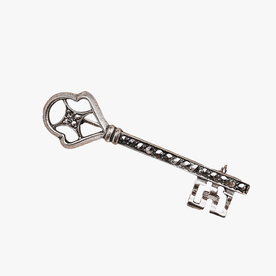 Old key-shaped brooch in 835 silver, set with marcasites
