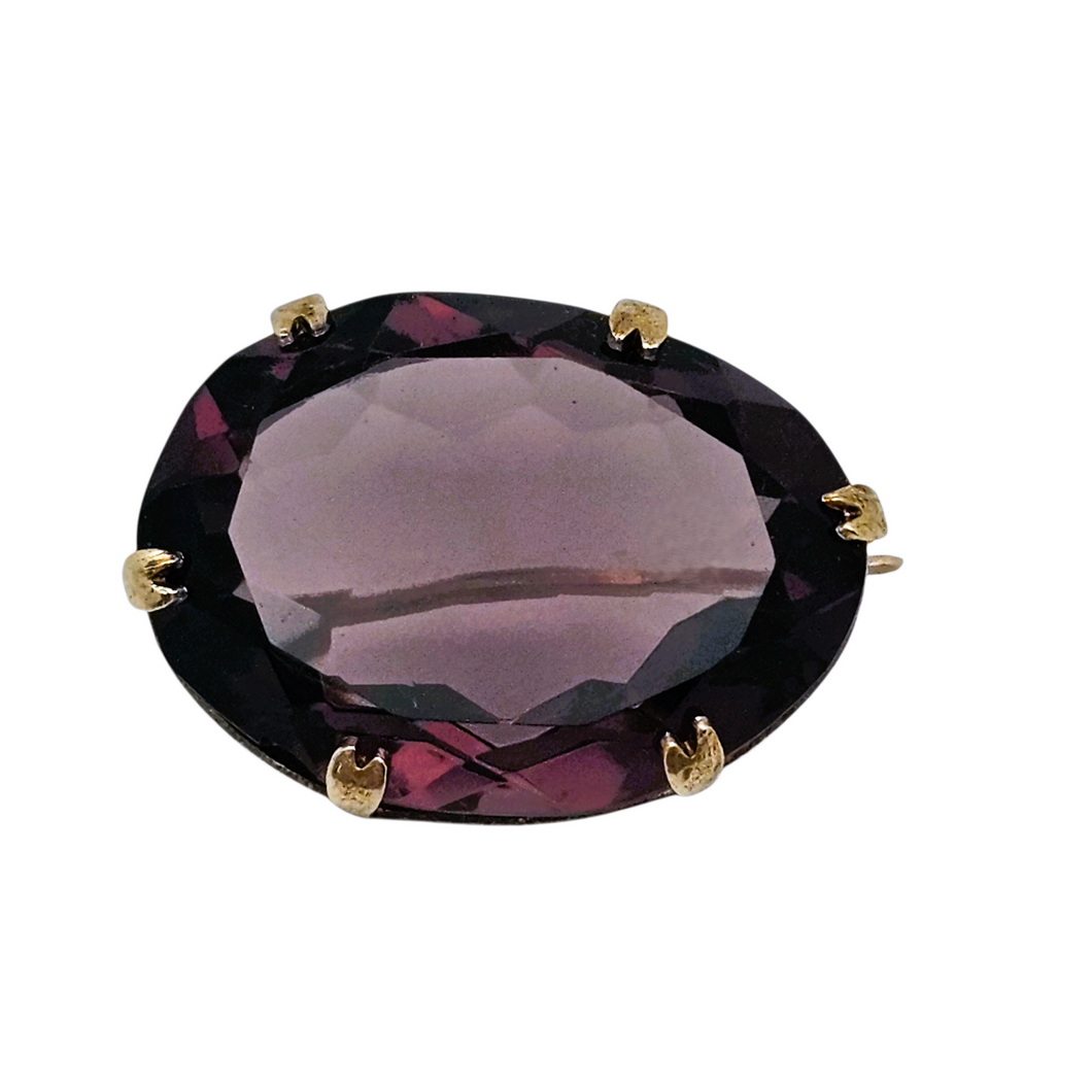 Broche ancienne ovale en cristal violet facetté et métal doré, fin XIXᵉ / début XXᵉ Le Charme des Violettes - Brocante en ligne