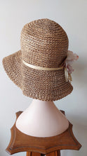 Load image into Gallery viewer, Seagrass hat with vintage flower
