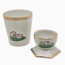 Charger l'image dans la galerie, Ensemble pour enfant en porcelaine de Limoges – Coquetier et gobelet décor pastoral – France, XXe siècle Le Charme des Violettes - Brocante en ligne
