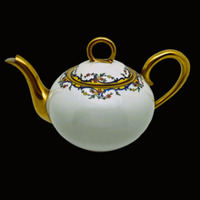 Load image into Gallery viewer, Madesclaire Emile, Limoges, 1920-1934. Art Deco teapot in white porcelain, gold and flowers
