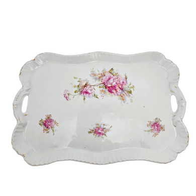 Plateau en porcelaine au décor de roses, début XXᵉ siècle Le Charme des Violettes - Brocante en ligne