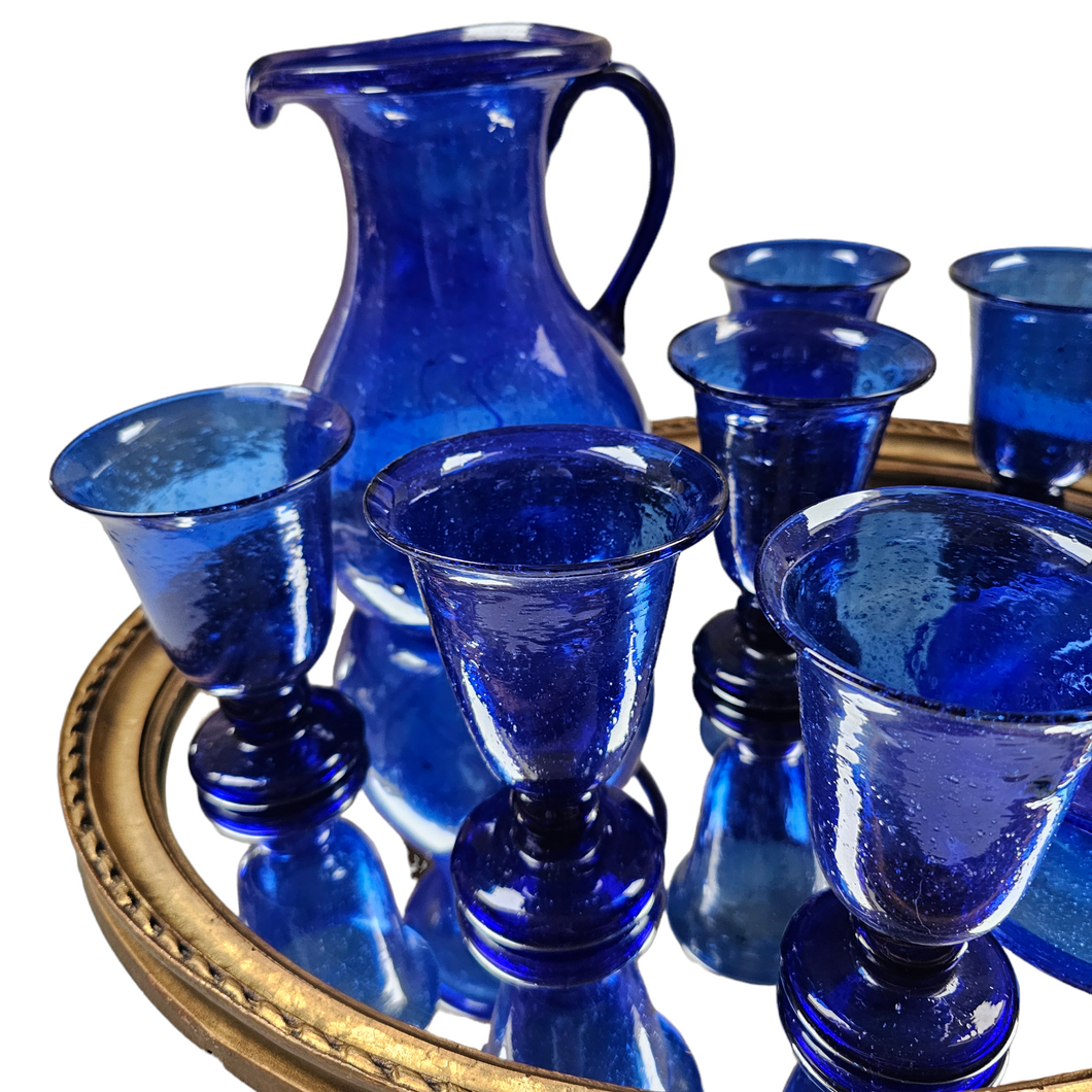 Suite of 6 glasses, 1 carafe and 1 vintage cup in mouth-blown blue glass, Egyptian craftsmanship