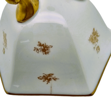 Load image into Gallery viewer, Sèvres (in the taste of). White porcelain tripod cup bordered with a gold frieze and small roses
