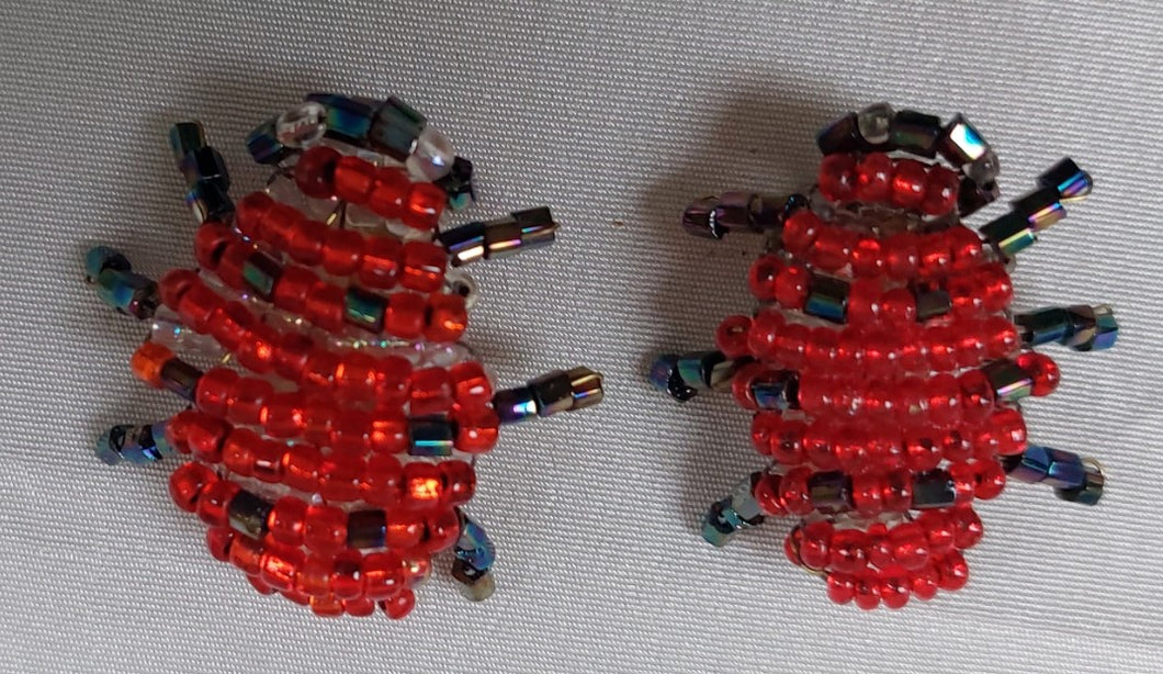 Set of vintage beaded ladybug brooches